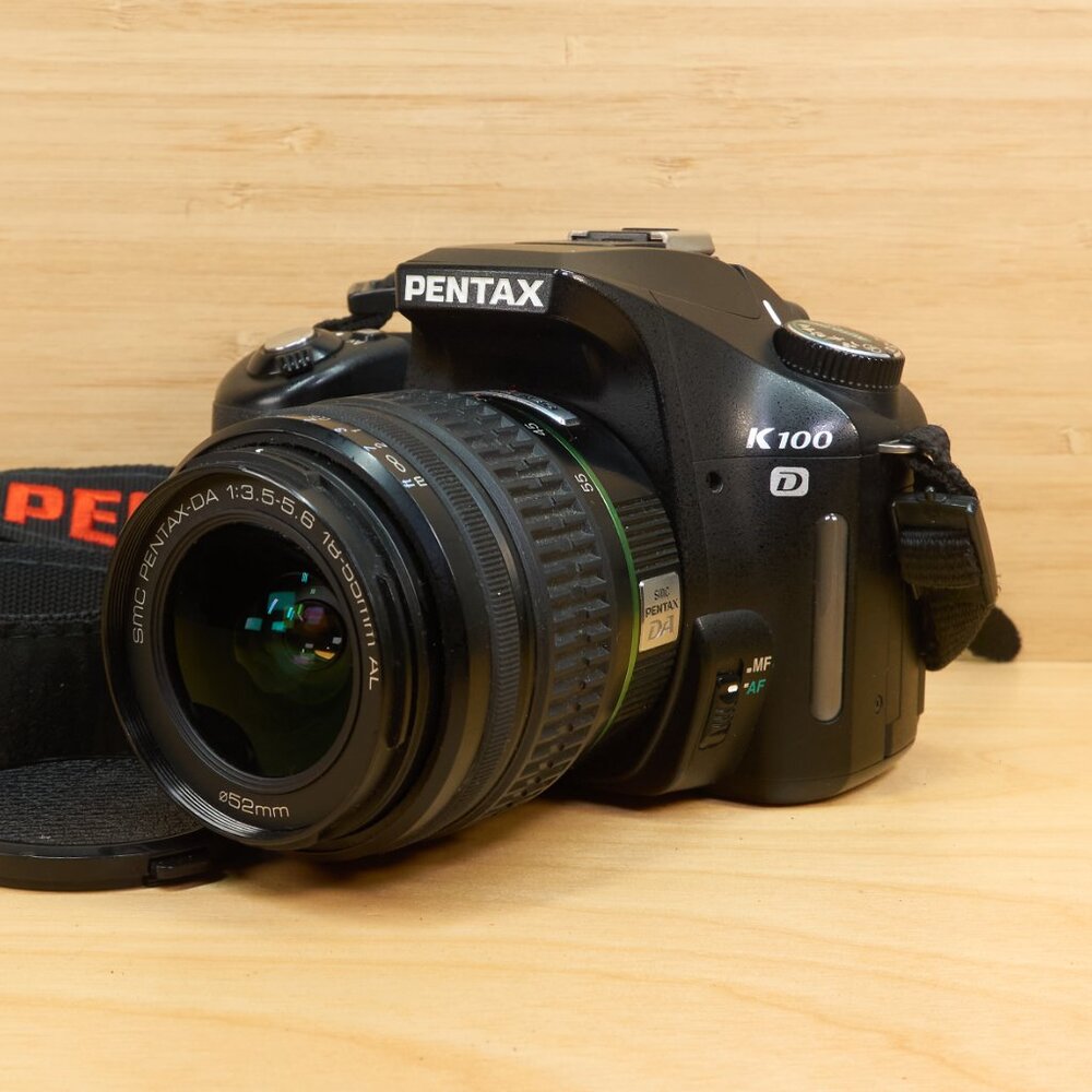 Pentax K100D 6.1 MP DSLR Camera with sms Pentax DA 18-55mm Lens